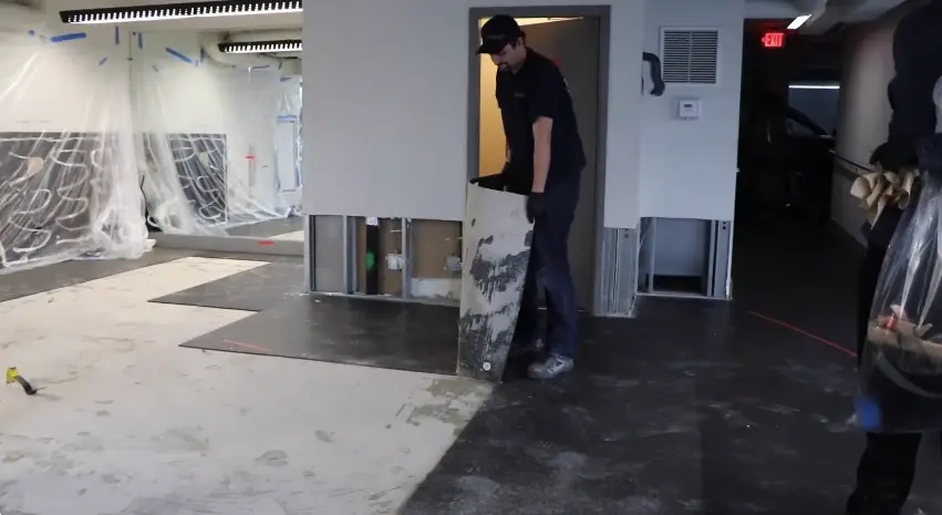 Garland Restore technician finding hidden water damage in a Garland, TX home